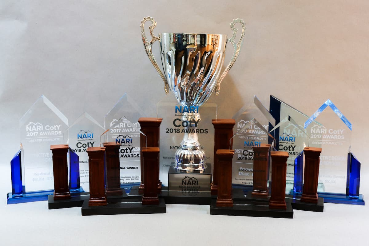 A collection of awards won by Distinctive Design + Build + Remodel for their remodeling projects in Charlotte, NC.