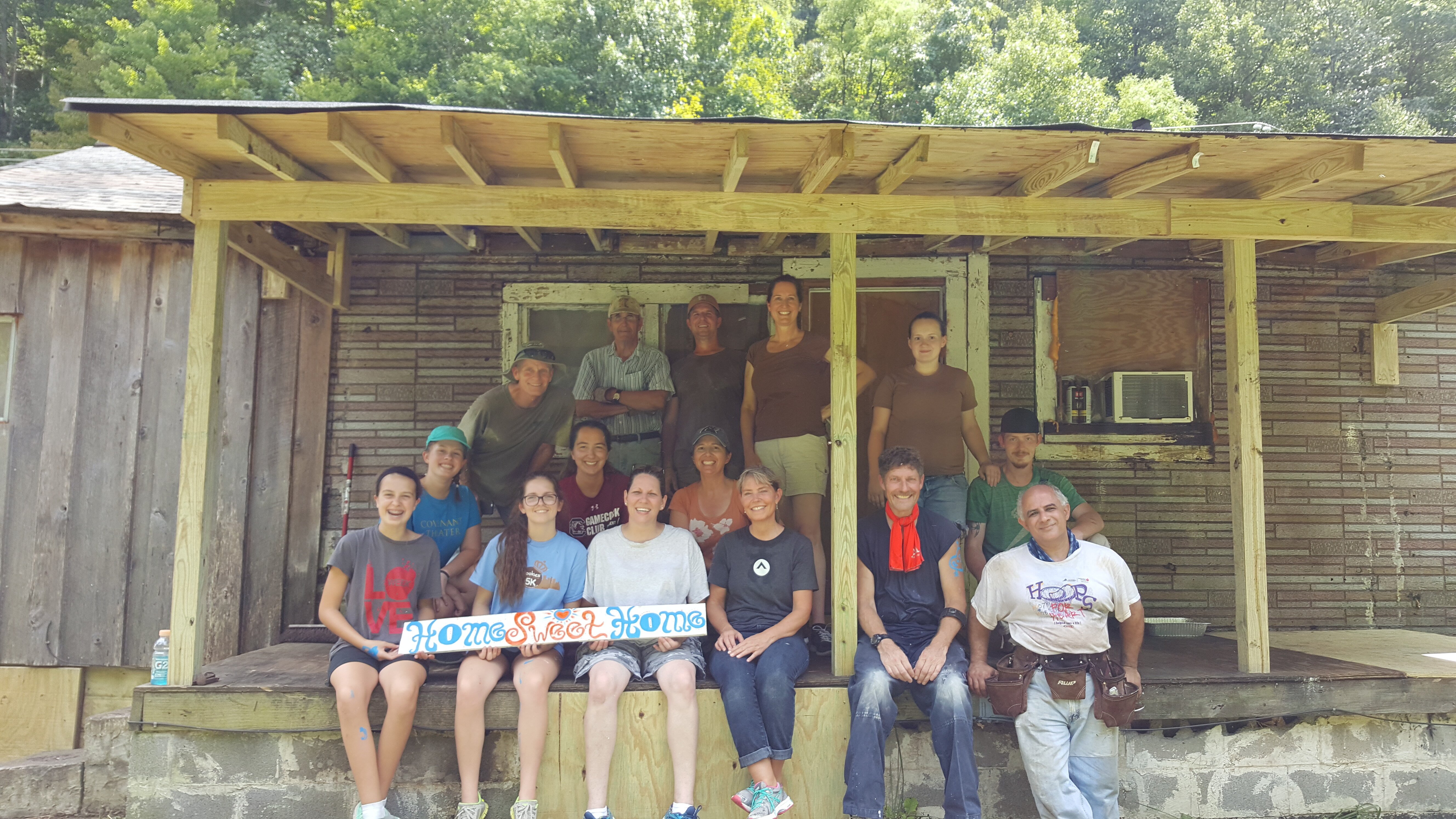 A team from Charlotte, NC volunteering to help repair homes for people living in poverty in McDowell County, WV.