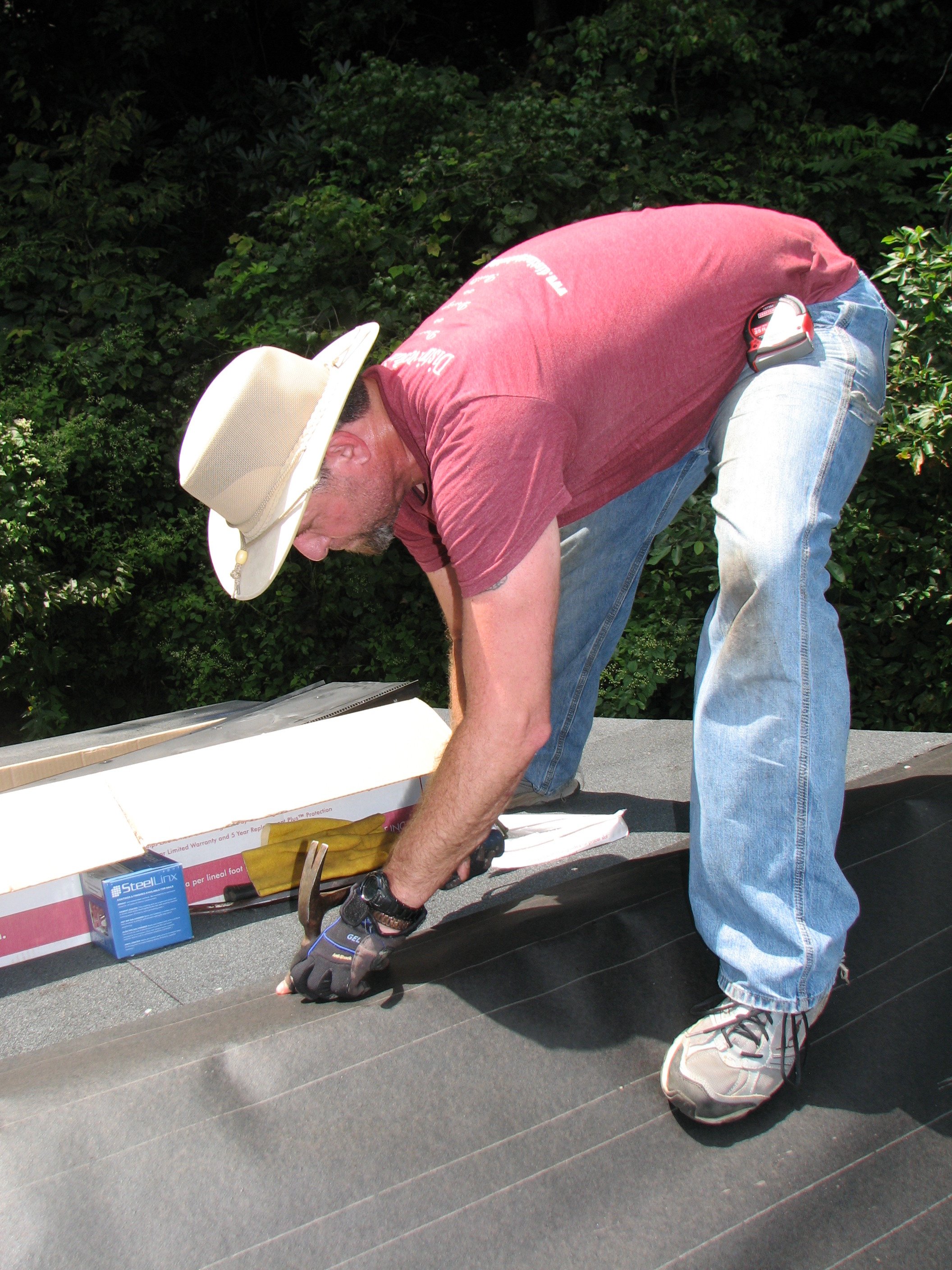 Vince Busby, General Contractor, making roof repairs during a mission trip to Appalachia.