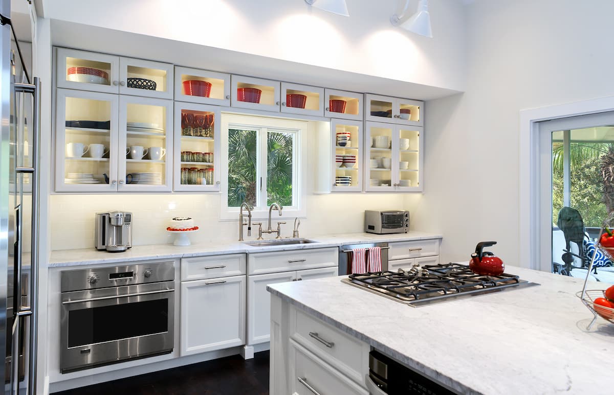 Award-winning kitchen remodel with propane gas cooktop and downdraft on island by Distinctive Design + Build + Remodel on Kiawah Island, SC.