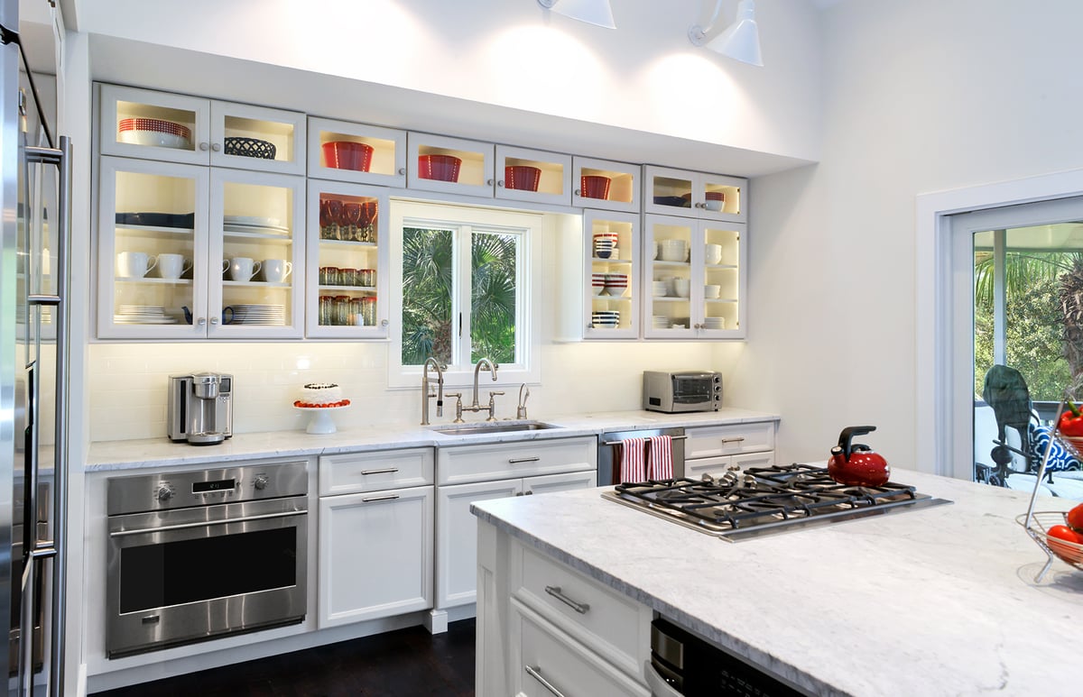 Award-winning kitchen remodel with propane gas cooktop and downdraft on island by Distinctive Design + Build + Remodel on Kiawah Island, SC.