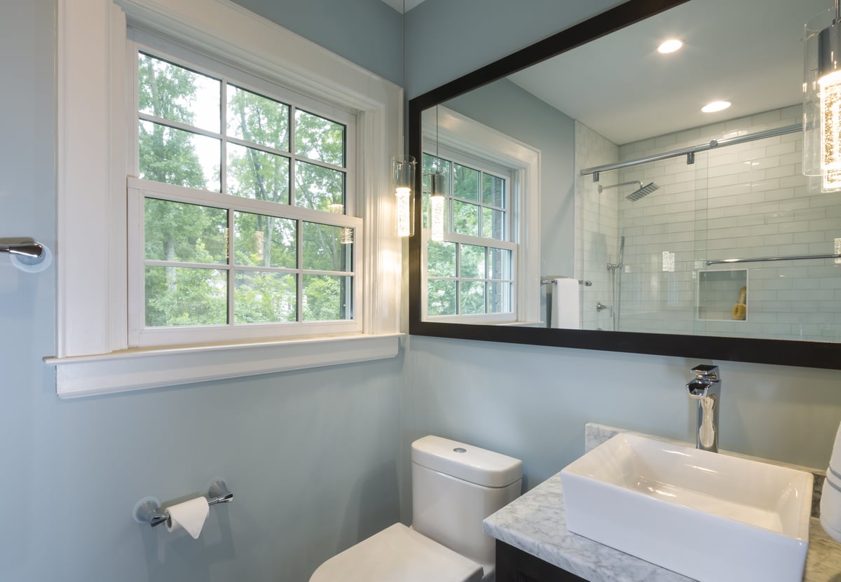 Award-winning bathroom remodel by Distinctive Design + Build + Remodel in a historic home in Myers Park with vessel sink in Charlotte, NC.