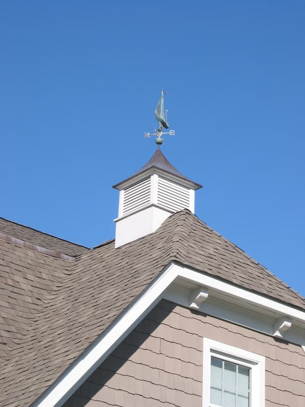 Weather vane on top of a custom home in Cornelius, NC.