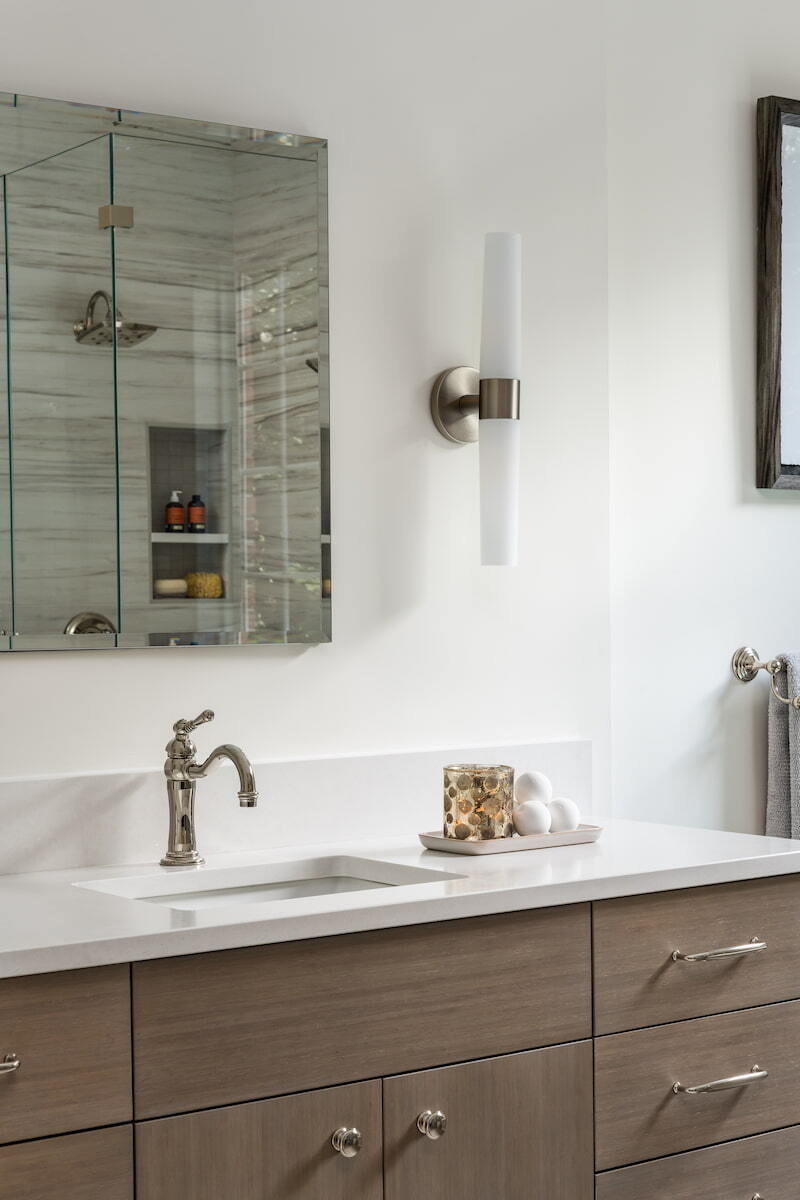 Bamboo cabinetry in a master bathroom remodel by Distinctive Design + Build + Remodel in Charlotte, NC.