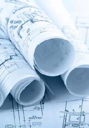 Rolled up blueprints for remodeling and custom building in Charlotte NC