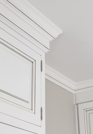 Inset cabinetry with exposed hinges and pewter glaze in Charlotte, NC.